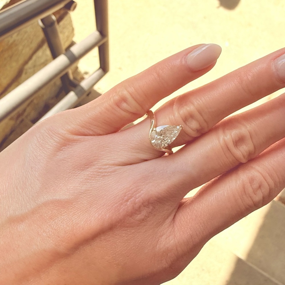 14kt gold 2carat lab grown diamond pear shaped engagement ring.